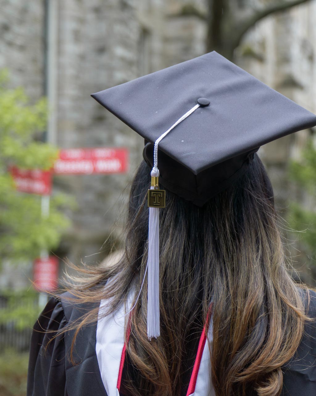 A behind-the-cap shot of a newly graduate